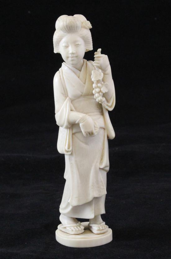 A Japanese ivory figure of a