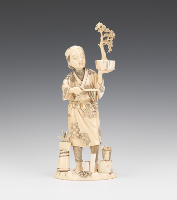 A Japanese Ivory Figurine of a