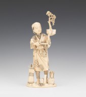 A Japanese Ivory Figurine of a