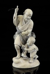 A Japanese ivory group of a fi