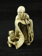 A Japanese ivory group of raka