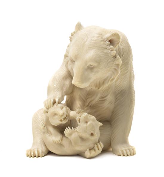 A Japanese Ivory Model of Three