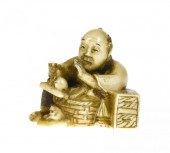 A JAPANESE IVORY NETSUKE <br /