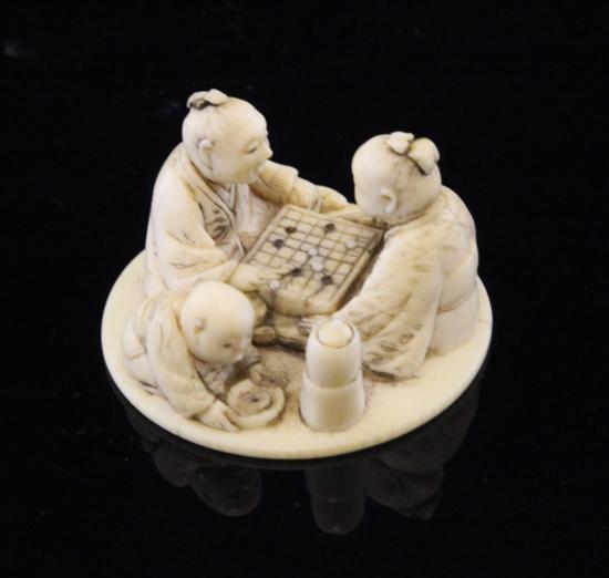 A Japanese ivory netsuke of two