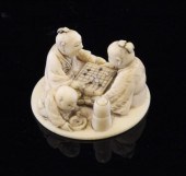 A Japanese ivory netsuke of tw