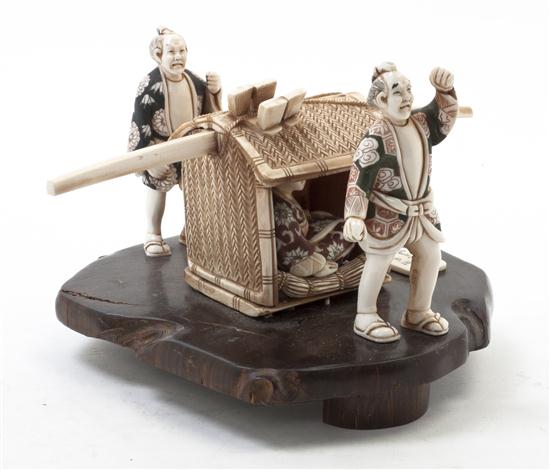 A Japanese Ivory Okimono the