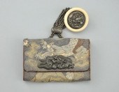 A Japanese Kagamibuta Netsuke