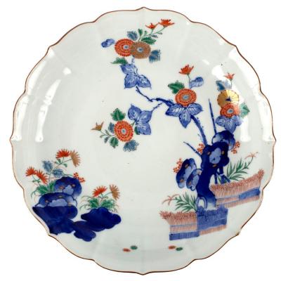 A Japanese Kakiemon fluted circular