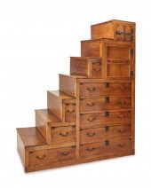 A JAPANESE KIRI WOOD STEPPED T
