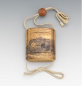 A Japanese Lacquer Inro With O
