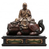 A JAPANESE LACQUERED AND GILT