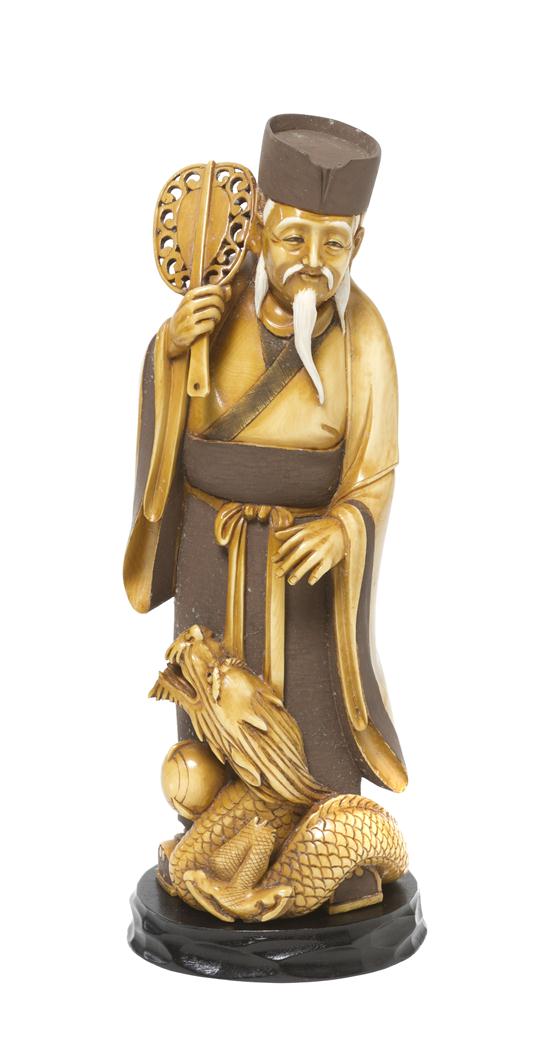 A Japanese Okimono of a Sage with a