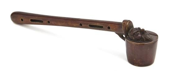 A Japanese Patinated Bronze Opium