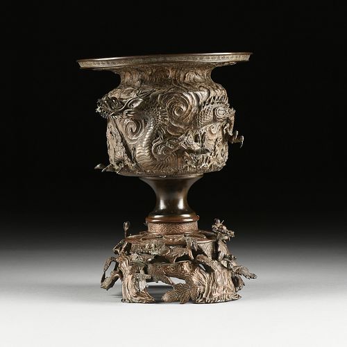 A JAPANESE PATINATED BRONZE