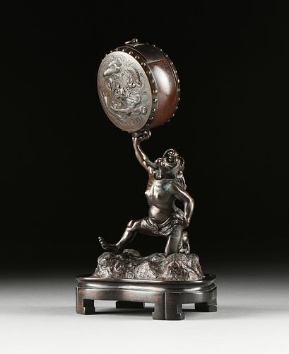 A JAPANESE PATINATED SPELTER FIGURE