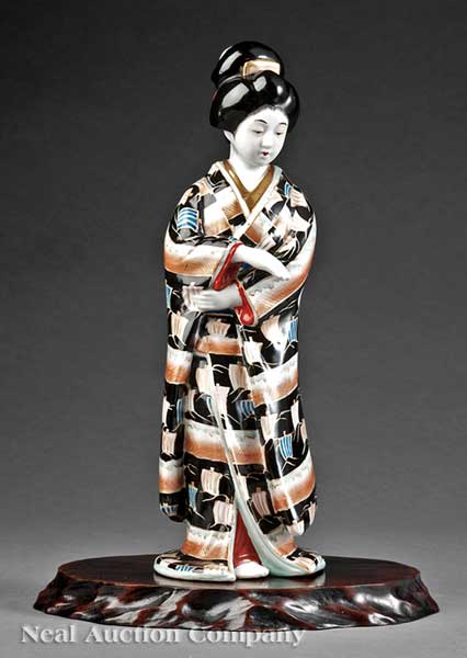 A Japanese Porcelain Figure of a