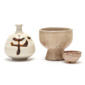 A JAPANESE SAKE BOTTLE AND BUD
