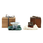 A JAPANESE SAKE CUP STAND AND