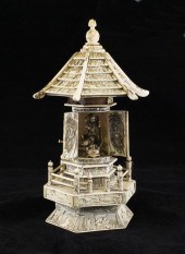 A Japanese sectional ivory por