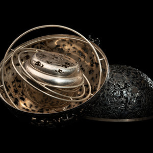 A Japanese Silver and Parcel Gilt