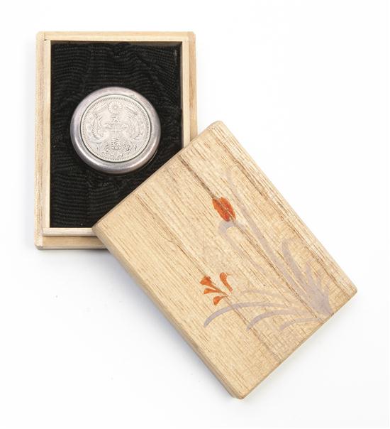 *A Japanese Silver Coin Mounted Box
