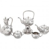 A Japanese Silver Five-Piece T