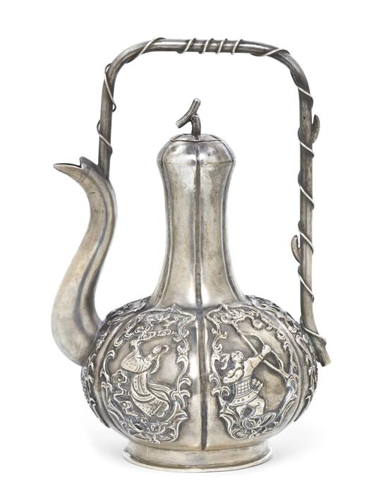 A Japanese Silver Teapot of lobed