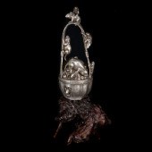 A JAPANESE SILVERED BRONZE OKI
