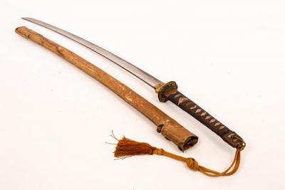 A Japanese sword mounted for WWII