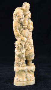 A Japanese walrus ivory group
