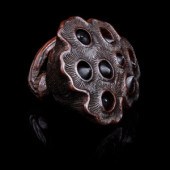 A Japanese Wood Netsuke of Lot