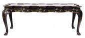 A JAPANNED BLACK LAQUER LOW TA