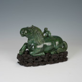 A JASPER CARVING OF A LYING HO