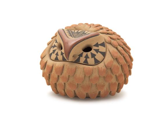 A Jemez Clay Feathered Owl with