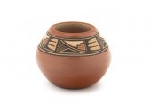 A Jemez Miniature Pot having a