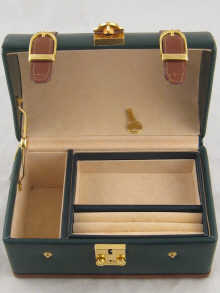 A jewel case shaped as a green