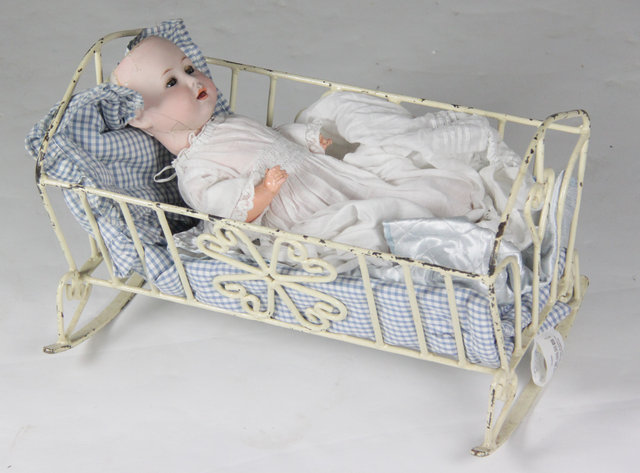 A Jutta doll marked 1914 8 1/2 to