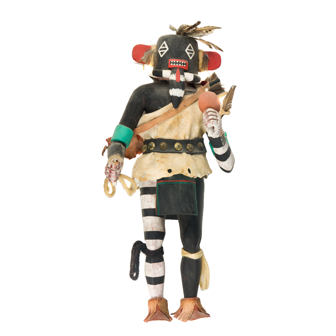 A KACHINA FIGURE OF A WARRIOR