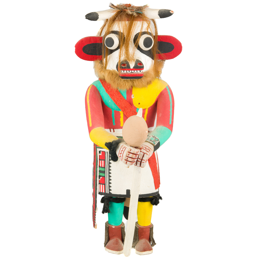 A KACHINA FIGURE WITH FUR, FEATHER,