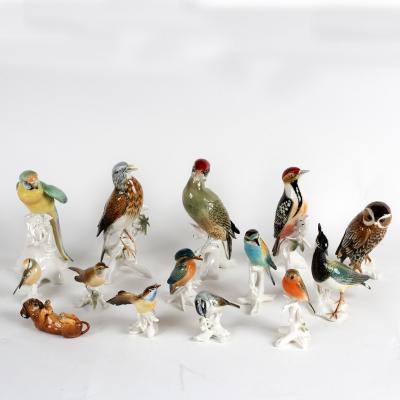 A Karl Ens figure of a parakeet,