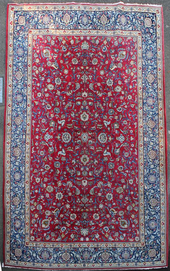 A Kashan carpet with field of