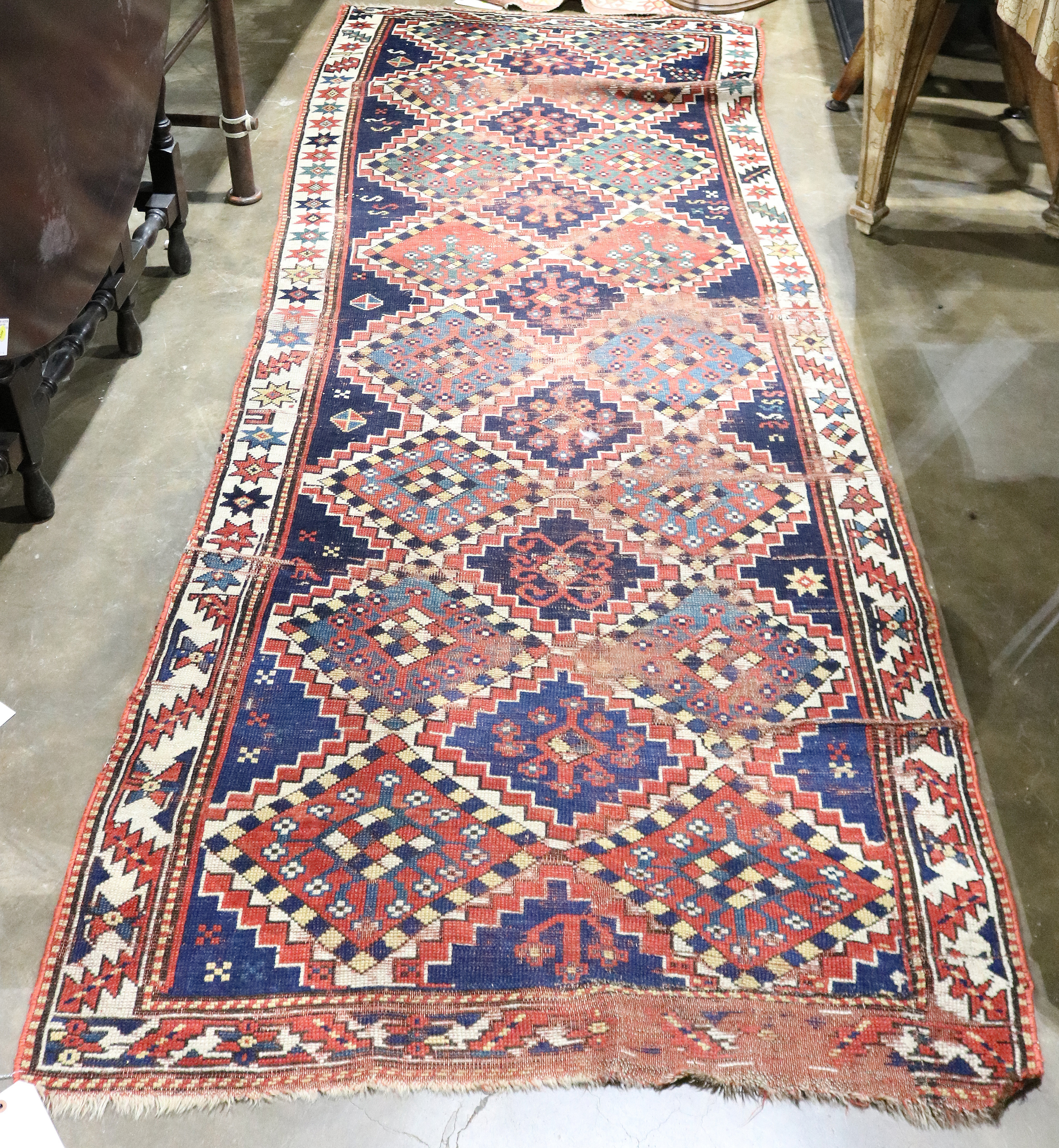 A KAZAK CARPET A Kazak carpet, 8'8"