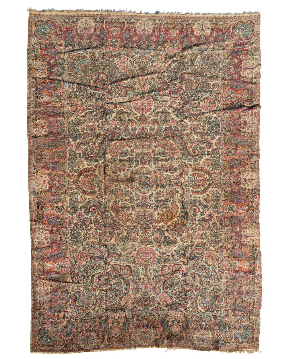 A KERMAN AREA RUGA Kerman area rug,