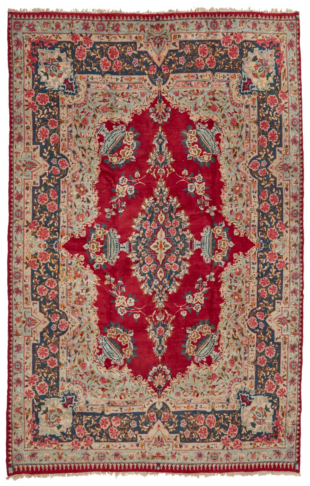 A KERMAN AREA RUGA Kerman area rug,