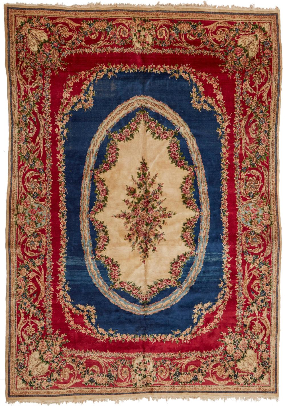 A KERMAN AREA RUGA Kerman area rug,