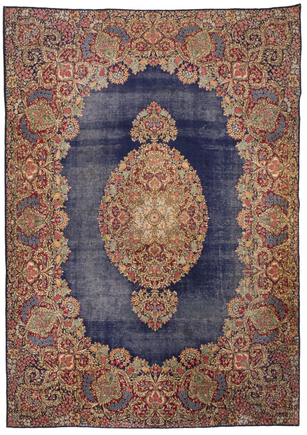 A KERMAN AREA RUGA Kerman area rug,