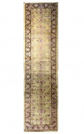 A KHOTAN CARPET, EAST TURKESTA