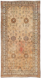 A KHOTAN LONG CARPET, EAST TUR