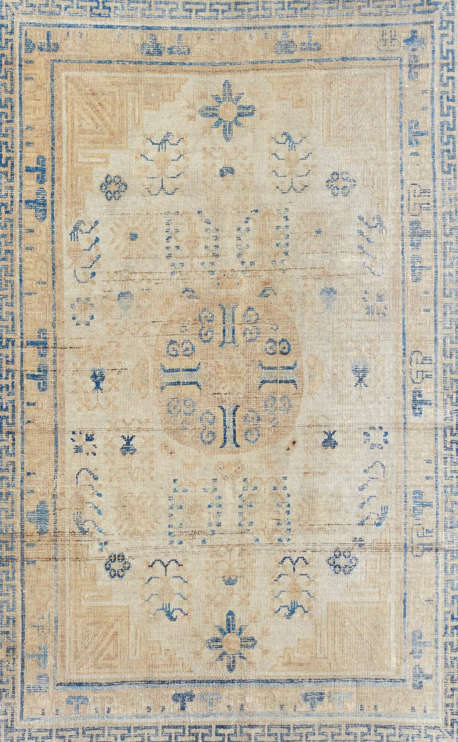 A KHOTAN RUG, EAST TURKESTANA