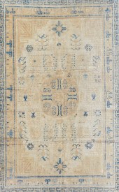 A KHOTAN RUG, EAST TURKESTANA